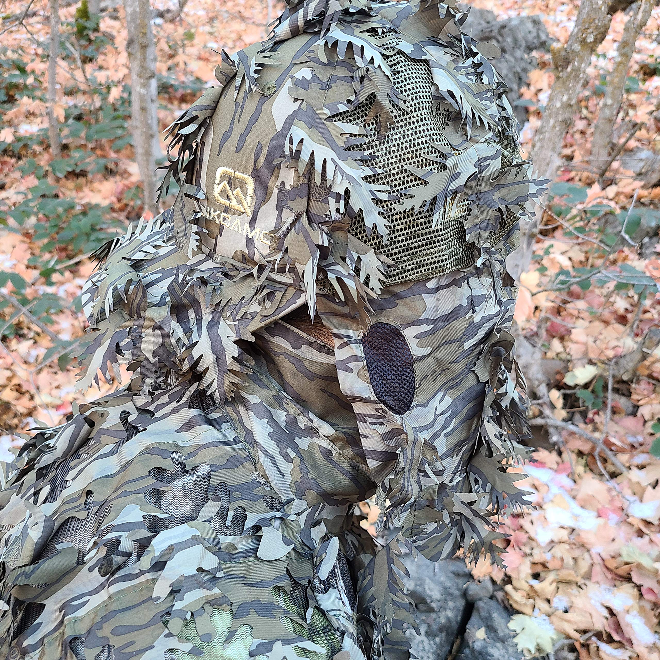 QuikCamo Mossy Oak Break-Up camo mask close-up fabric detail and breathability.