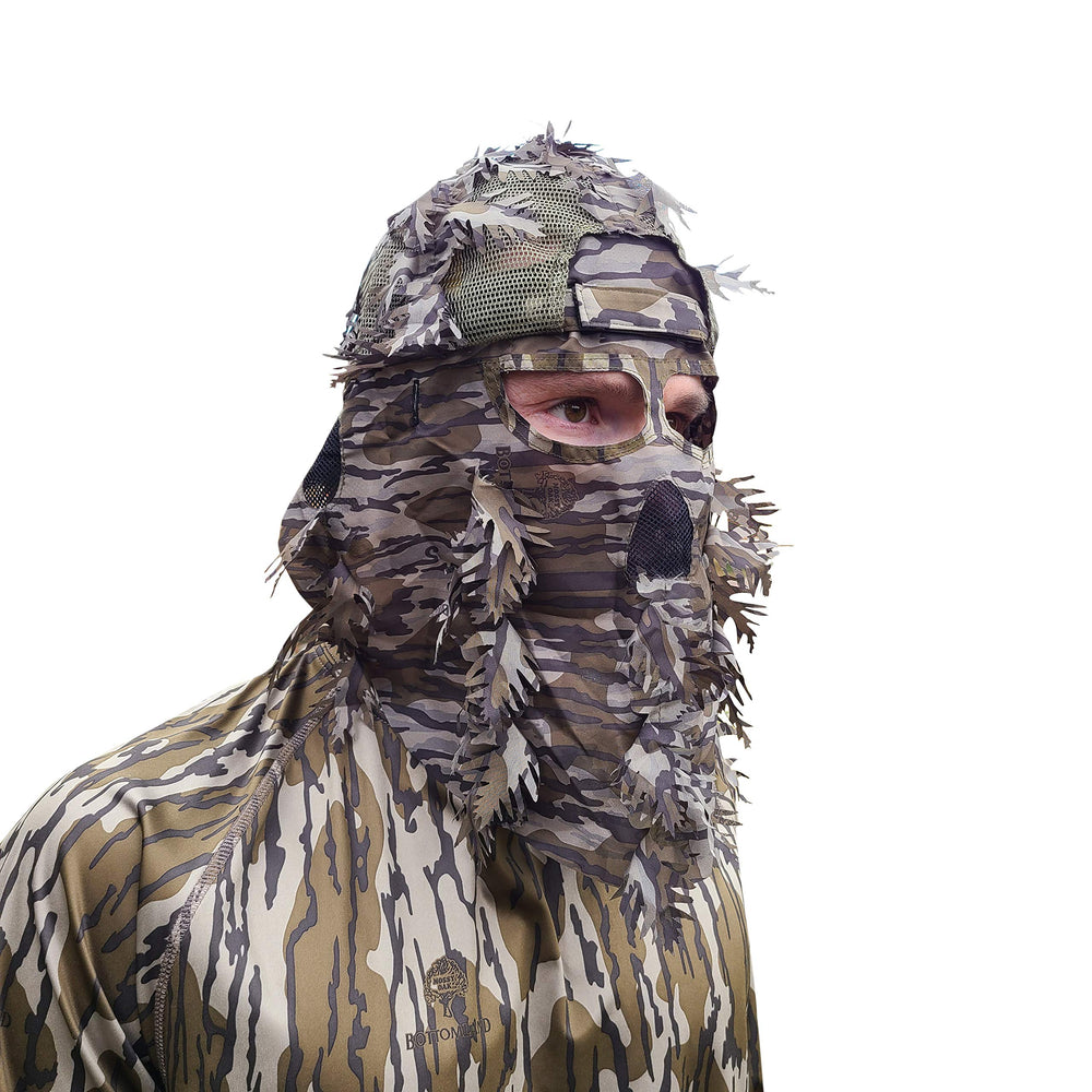 QuikCamo Mossy Oak Break-Up face mask hat front view for rapid concealment.