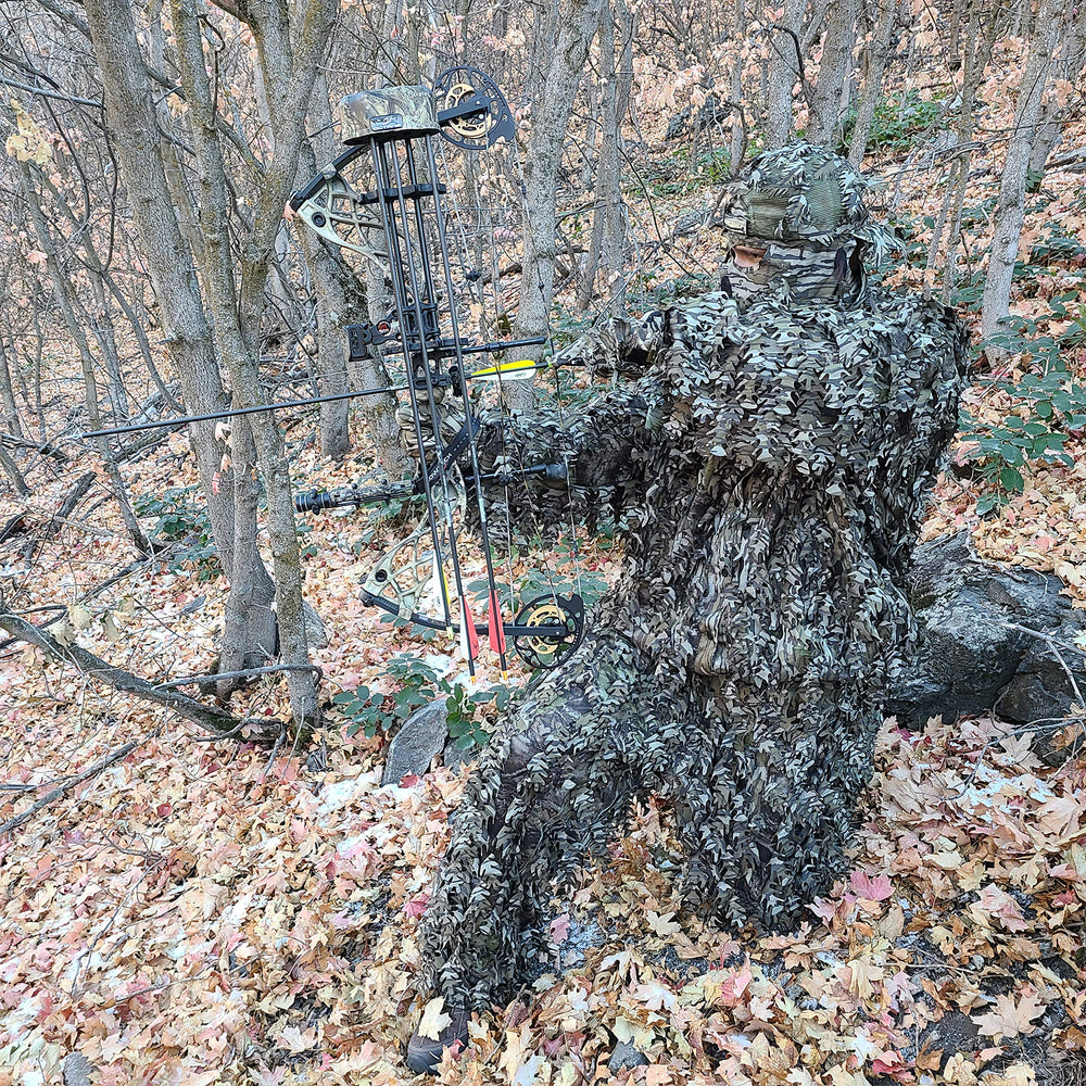 QuikCamo Mossy Oak Break-Up quick-dry fabric for moisture-wicking comfort.