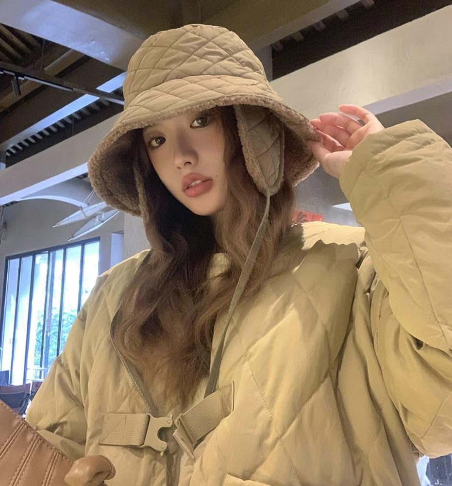 Woman wearing green quilted bucket hat outdoors
