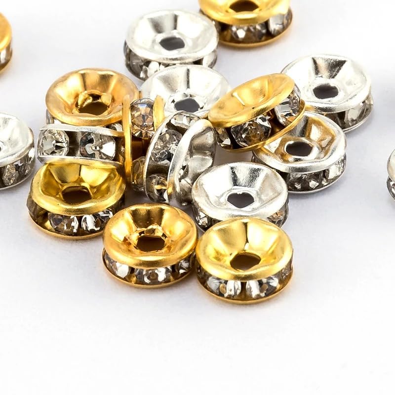 Quintathletic gold and silver beads closeup showing crystal rhinestones and polished finish for flash
