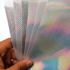 Quintathletic holographic fish-scale sticker sheet with rainbow reflections for durable lure customization.
