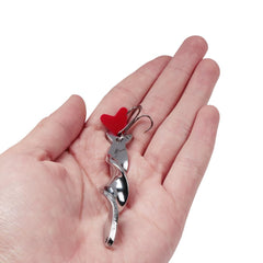 Quintathletic spinner spoon boosts pike attraction through bright flash and vibration.