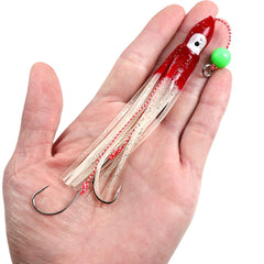 Quintathletic pink glitter squid jig lure enhances visibility near structures