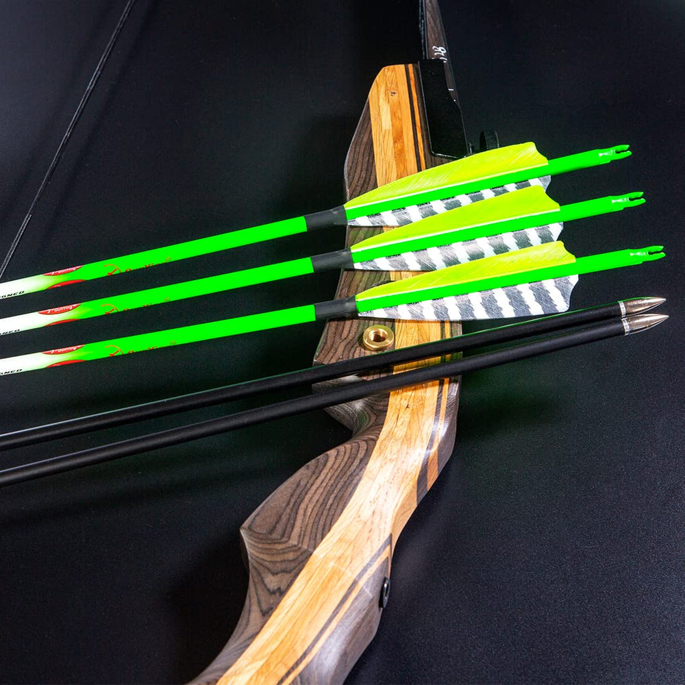 4-inch turkey feather vanes on a QunYing arrow for consistent trajectory.