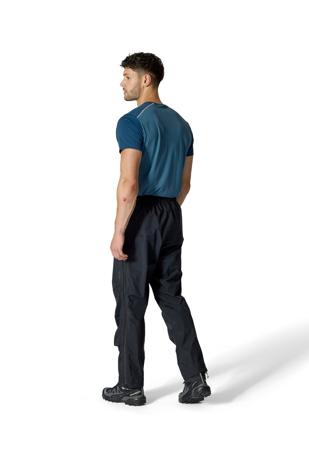 Rab Downpour Mountain Pants packable design demonstrates compact storage for travel
