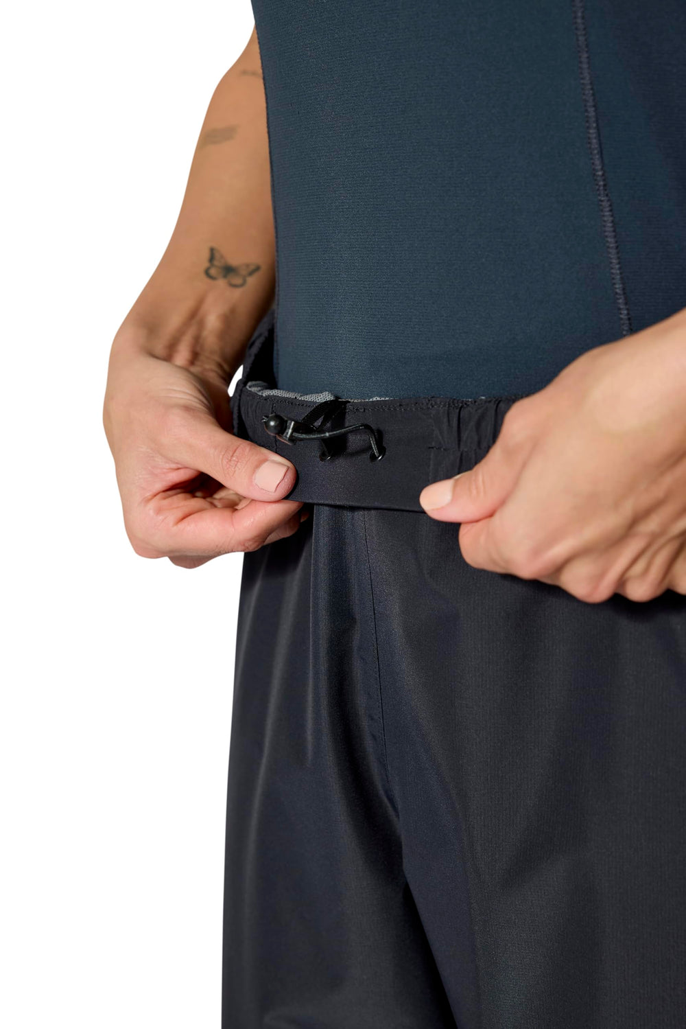 Rab Downpour Pants hem adjustment keeps fit secure over footwear
