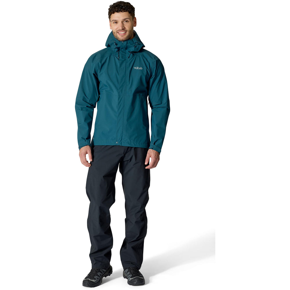 Rab Firewall pants side zip open demonstrates quick ventilation and easy boot over pants.