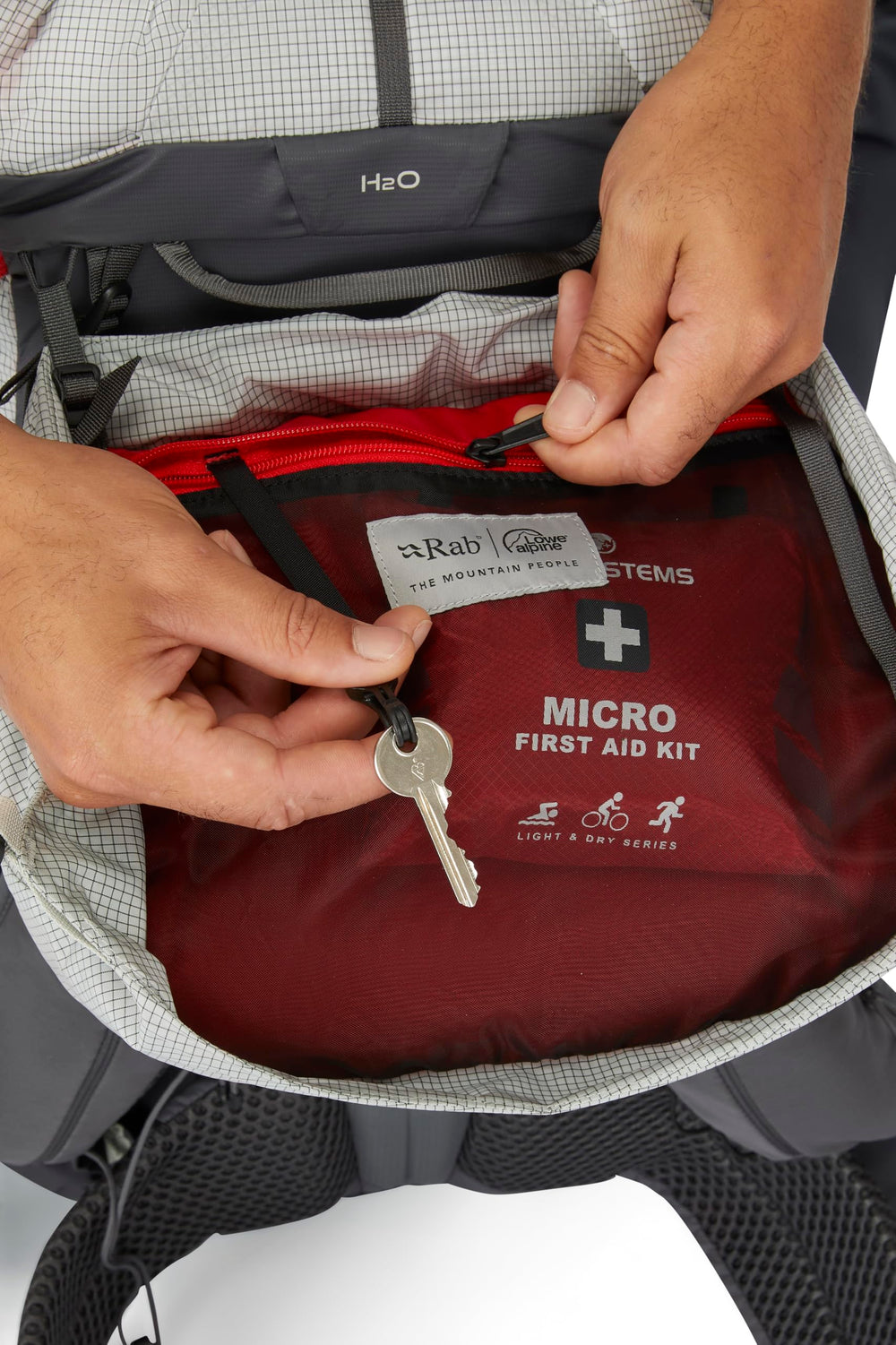 Rab Muon 50L bottom compression straps for securing bulky gear.