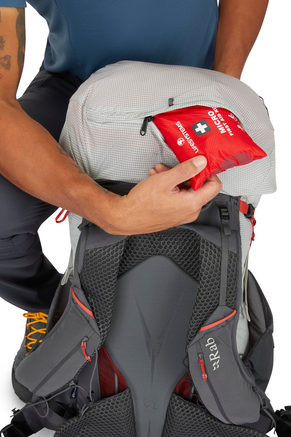 Rab Muon 50L front stash pocket keeps layers within easy reach.