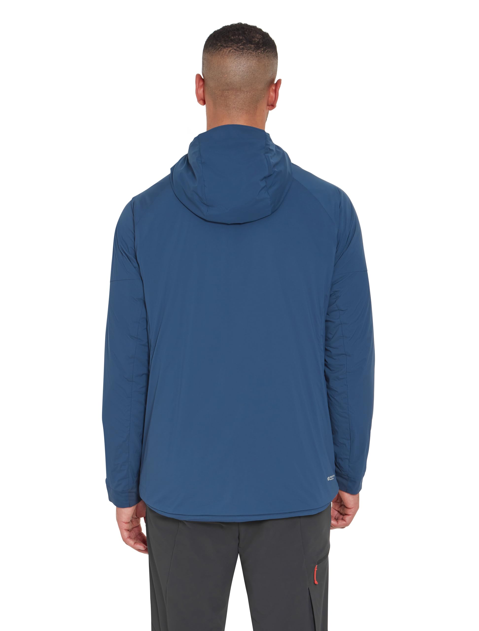 Rab VR Summit jacket worn in rugged mountains shows versatile protection.
