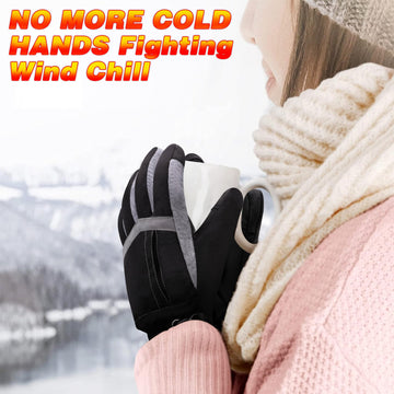 Rabbitroom Heated Gloves worn during snowy shoveling activity
