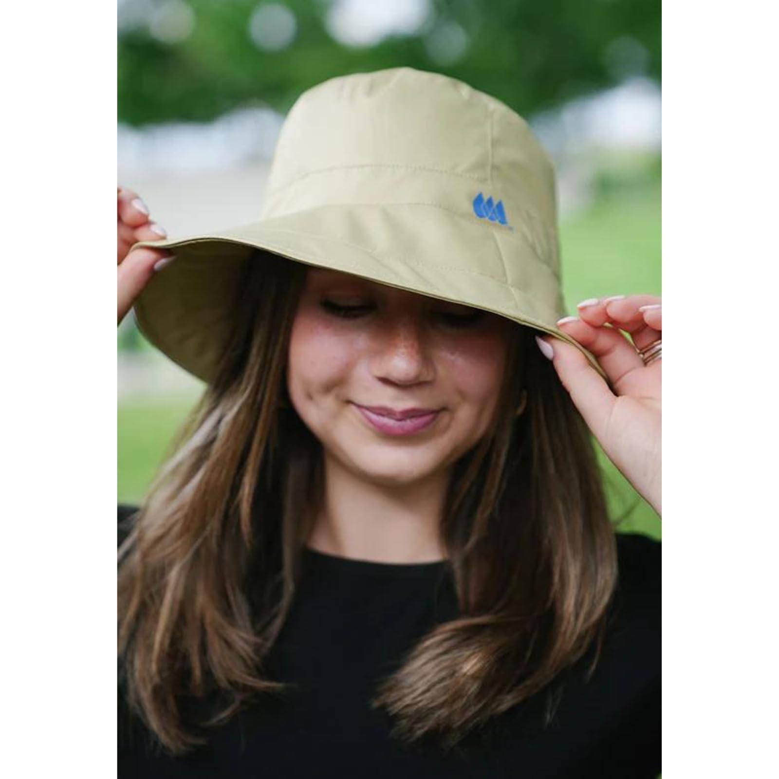 Rainraps Rain Cap waterproof wide brim protects from rain during outdoor activities.