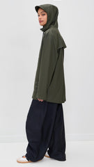 RAINS jacket side pockets: secure storage for essentials on city outings