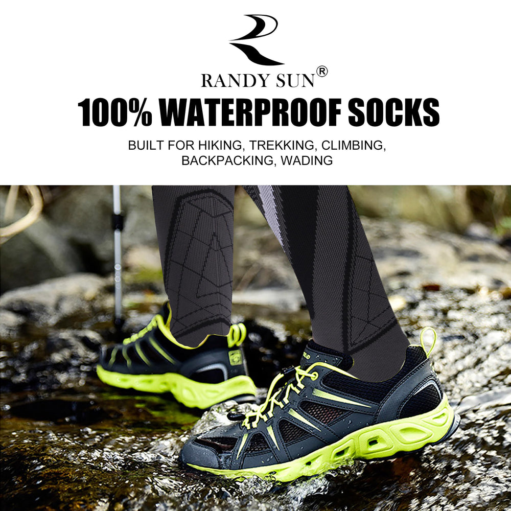 RANDY SUN knee-length waterproof socks inside boot during warm, dry trekking.