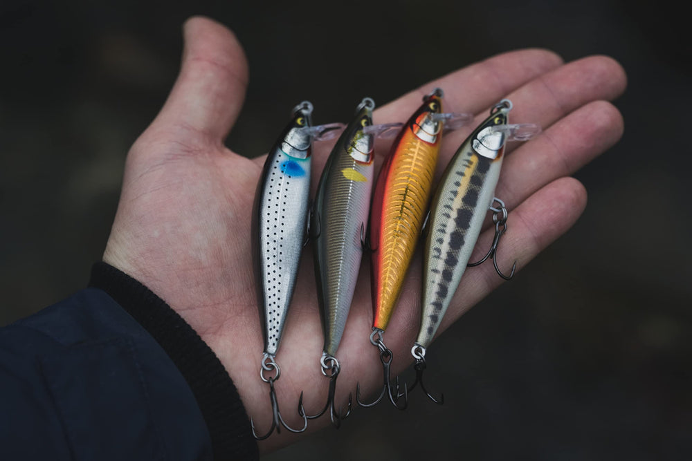 Rapala Countdown Elite 55 Gilded Minnow displayed on a hanging rack shows premium finish.