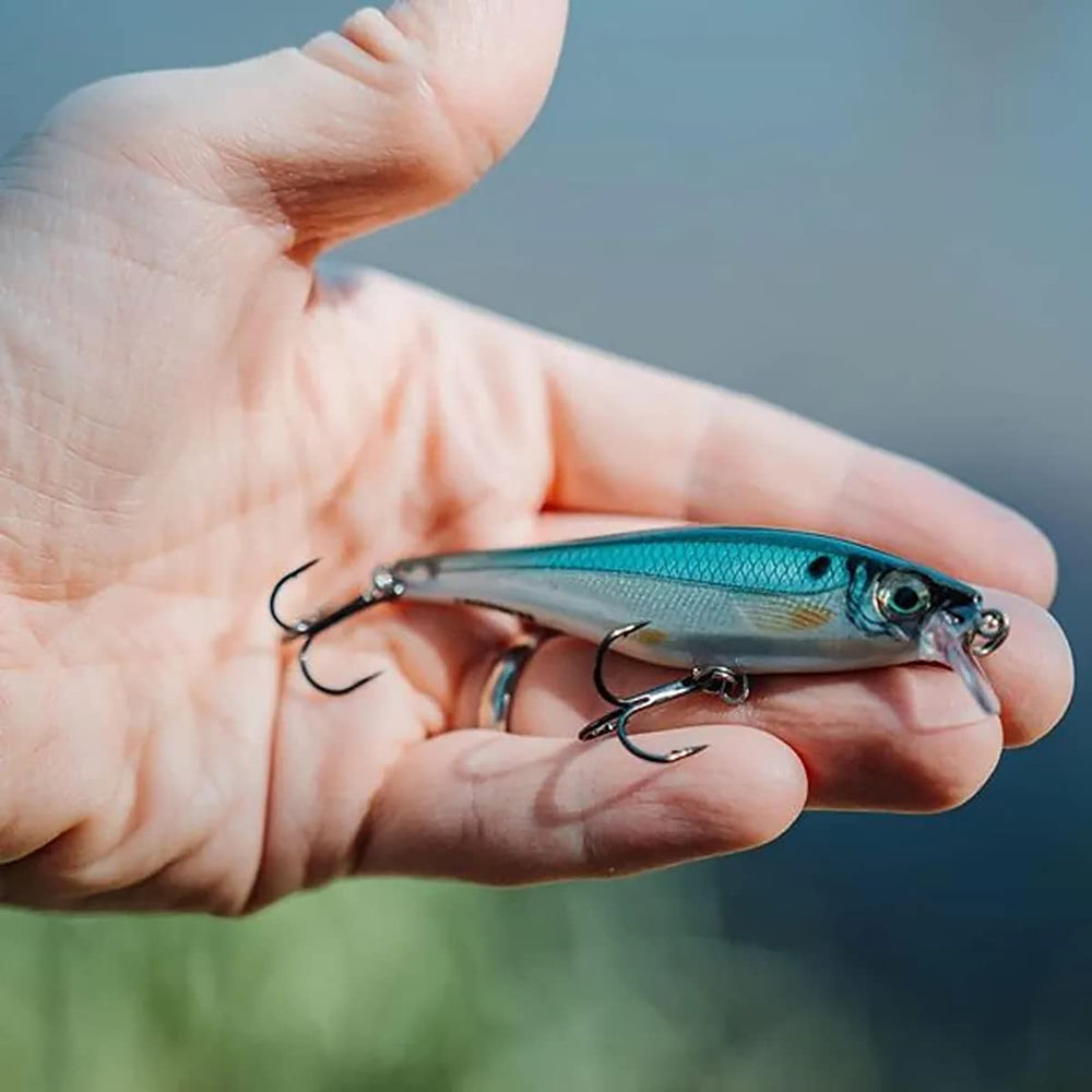 Rapala Jigging Rap 05 shows single reversed hooks and center treble with line tie