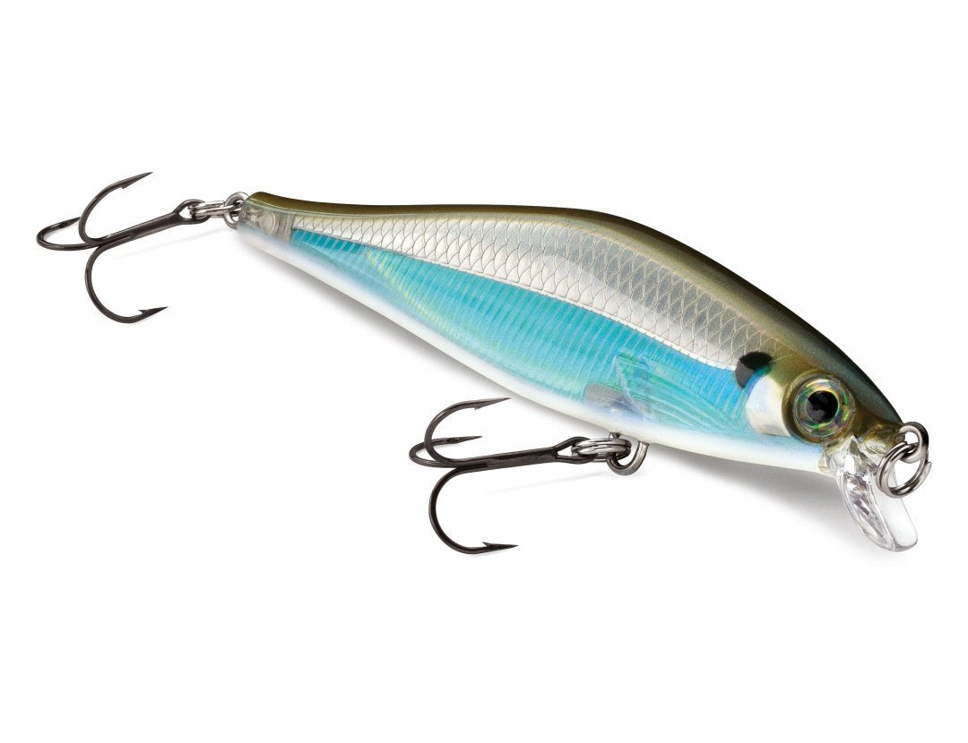 Shadow Rap Shad Halloween lure in water displaying wobble during a cast and retrieve.