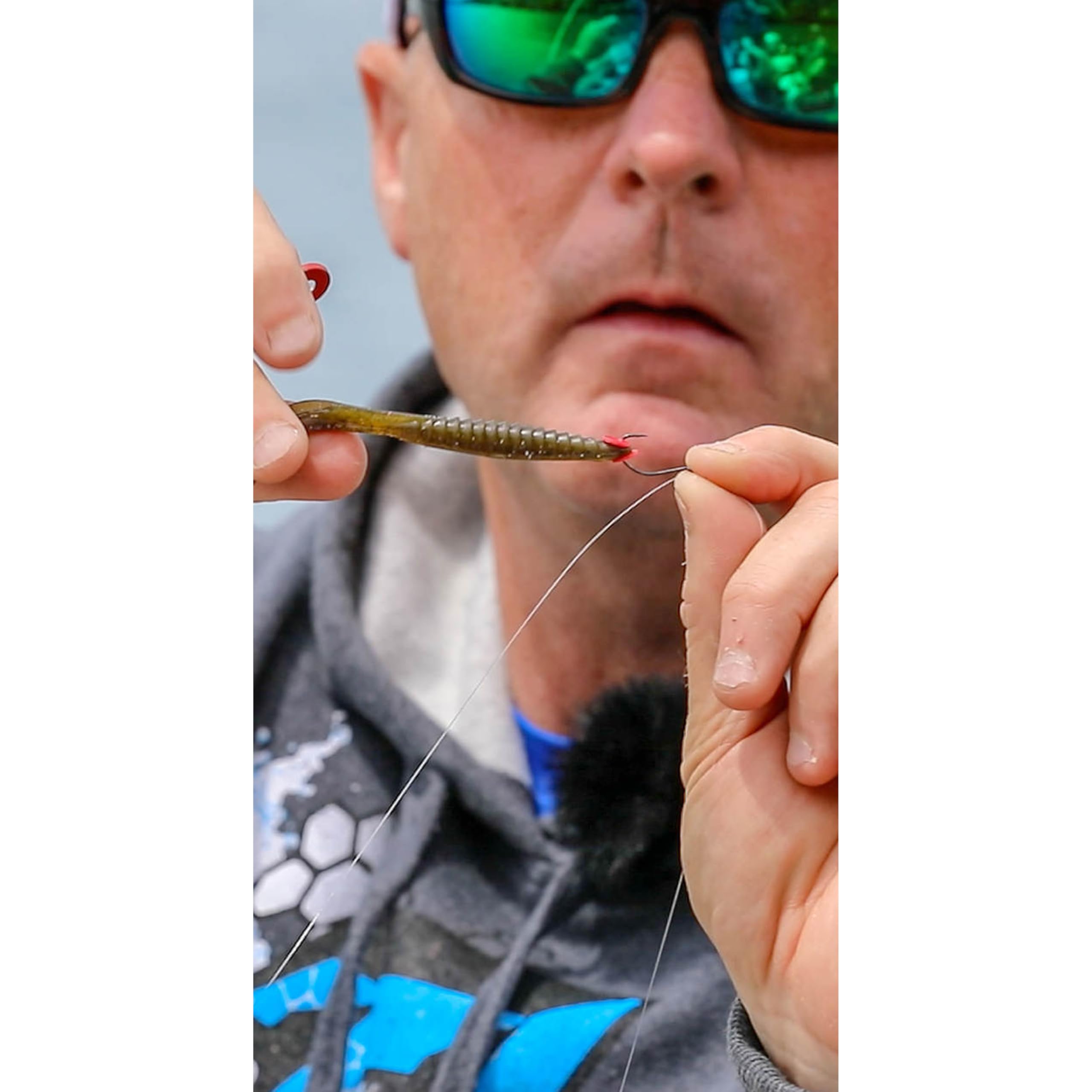 Rapid Hook-All Red Standard Edition shown in action for reliable bait placement during retrieval.