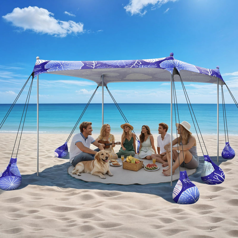 Raynesys beach tent 10x10 setup providing ample shade for family seaside day