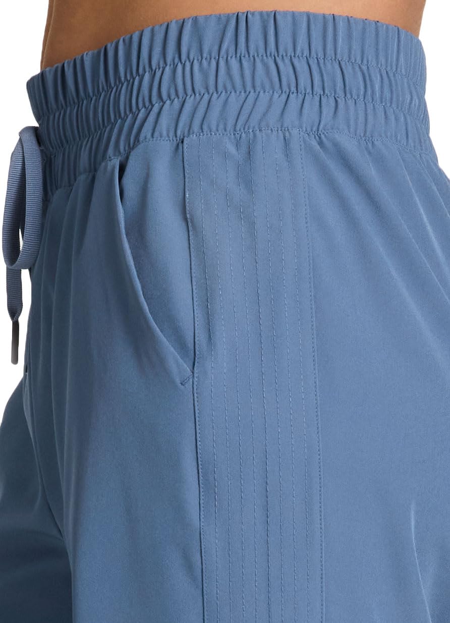 RBX wide leg pant with side pocket highlighted for secure storage during activities.