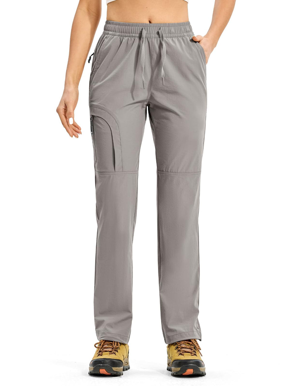 Rdruko pants water-repellent look in rainy scene conveys protection on wet trails