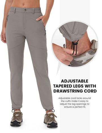 Rdruko hiking pants showing secure zippered pockets on trails