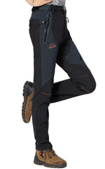 Rdruko women's snow pants waterproof fabric keep you dry during snowy outings.