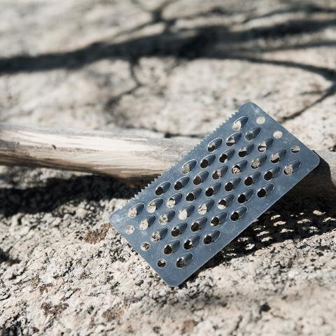 Readyman Tinder Scraper Card 2.0 close-up metal detail highlighting a durable edge for reliable use.