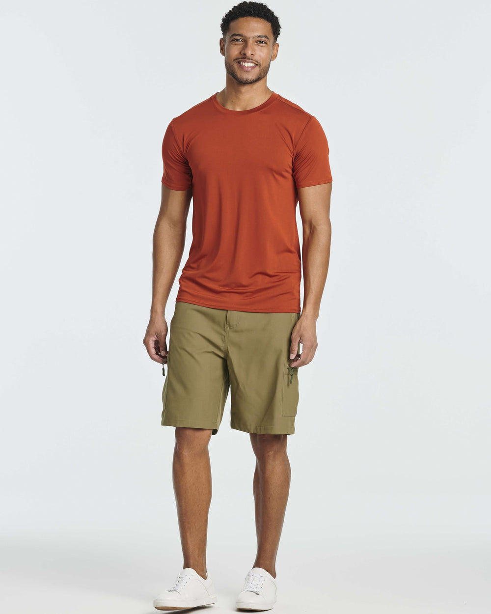 Real Essentials hiking shorts outdoor action scene shows durable design.