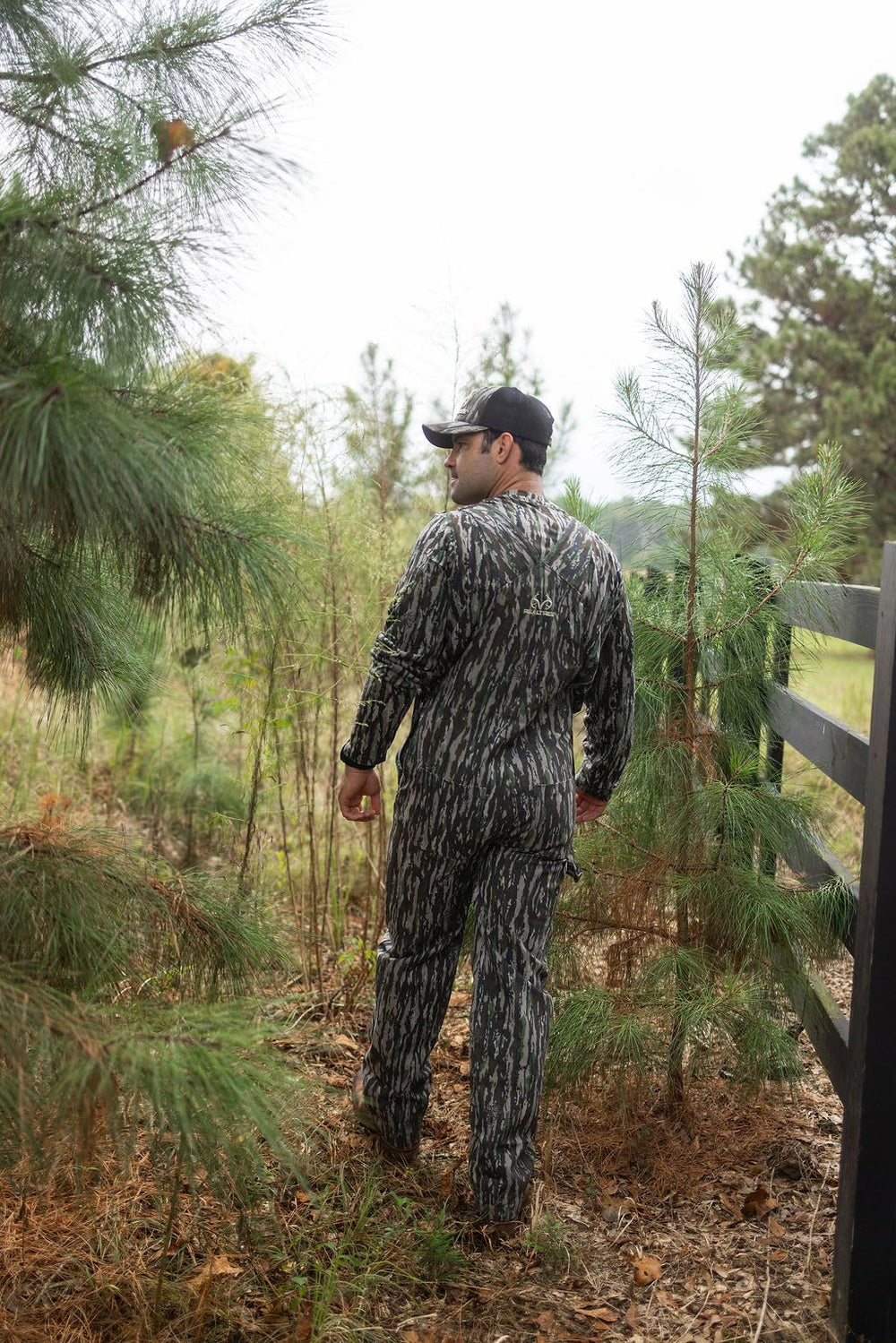 Realtree camo overalls feature durable canvas for tough outdoor days.