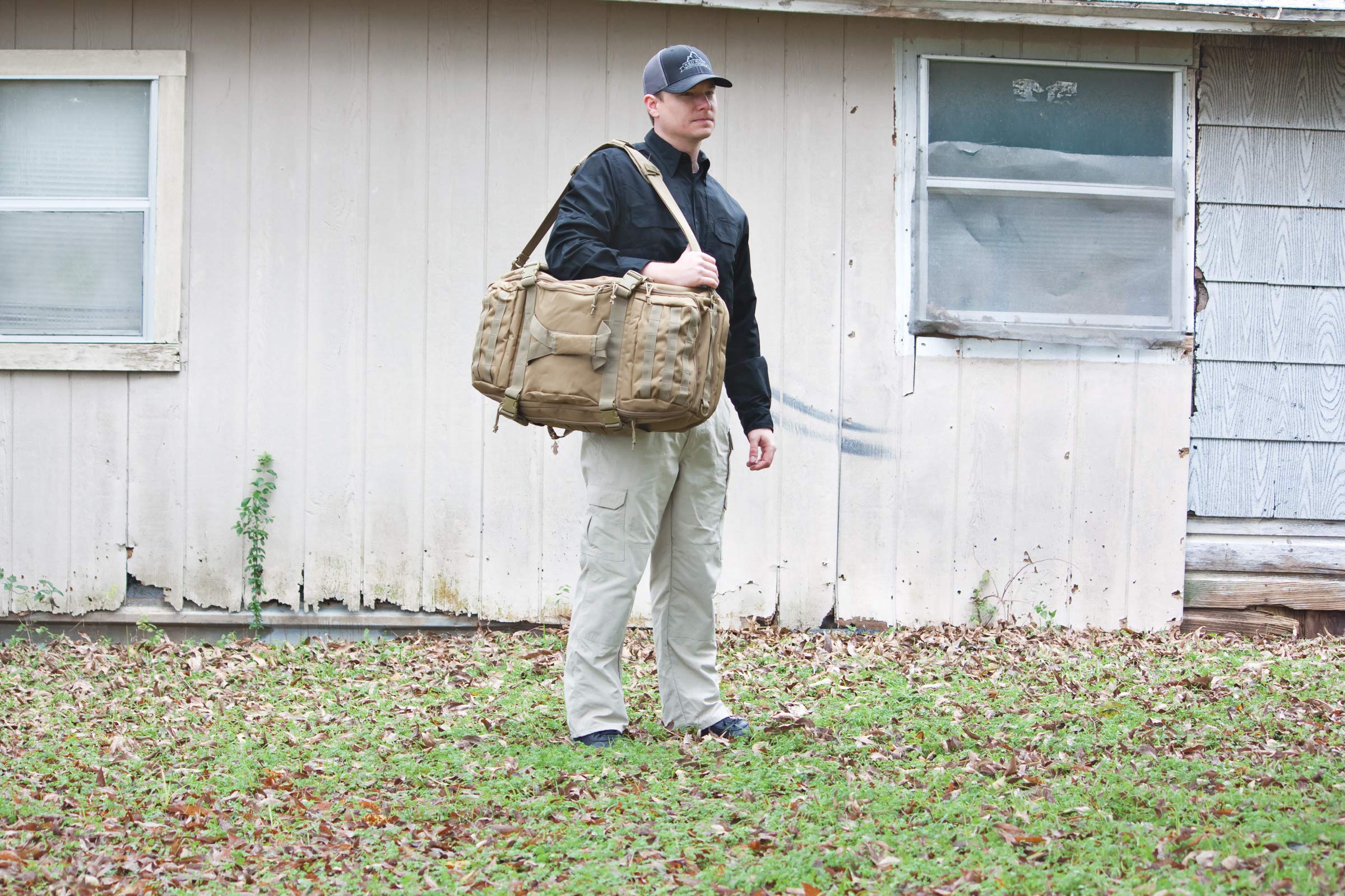Red Rock Traveler Duffle Pack end carry handles provide reliable lifting from any direction.