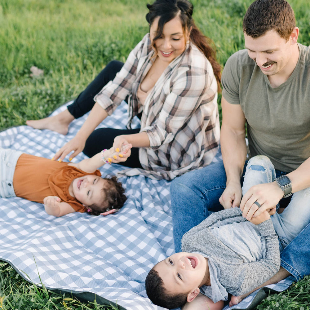 RED ROVR waterproof fabric blanket withstands spills and damp ground.