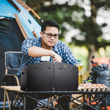 Redcamp bendable side panels adapt to uneven ground for stable cooking.