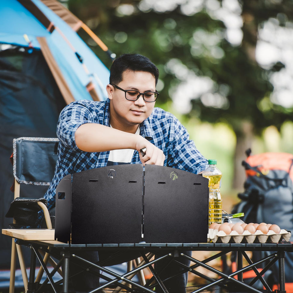 Redcamp bendable side panels adapt to uneven ground for stable cooking.