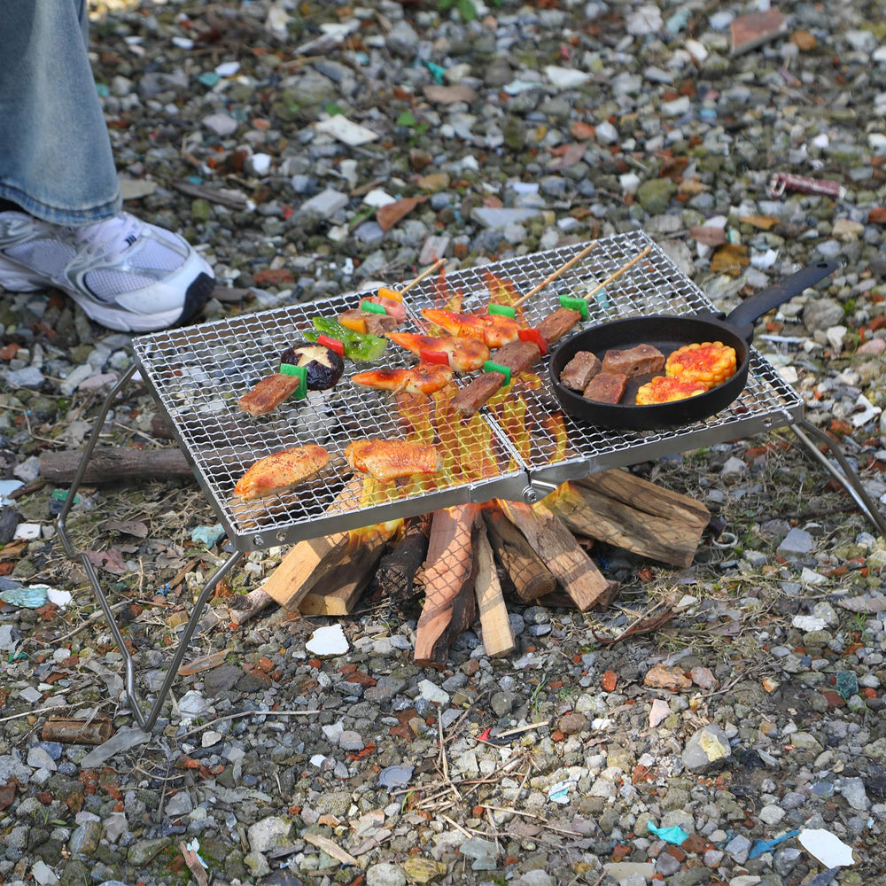 REDCAMP multi-use grill suitable for open fire, charcoal, gas, or stoves.