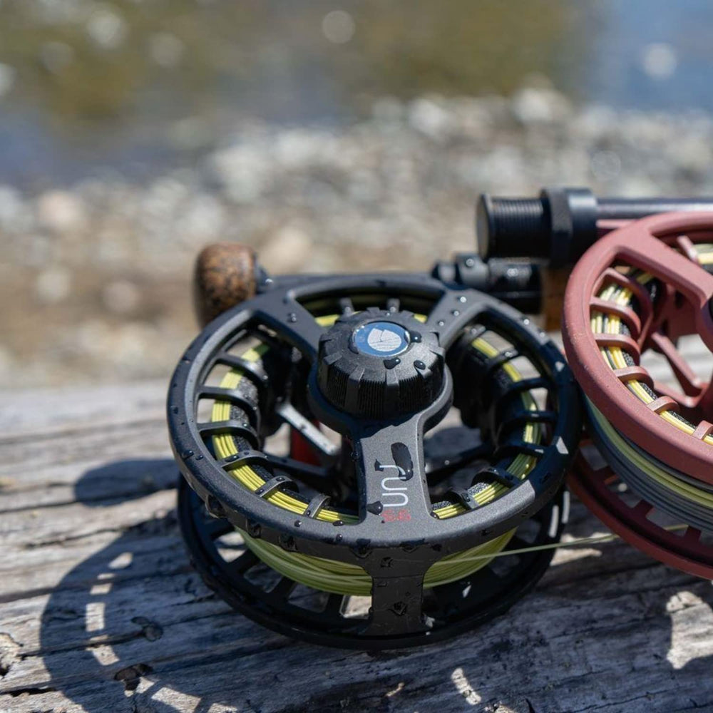 Redington Run fly reel in durable die-cast aluminum with a ported inner barrel.