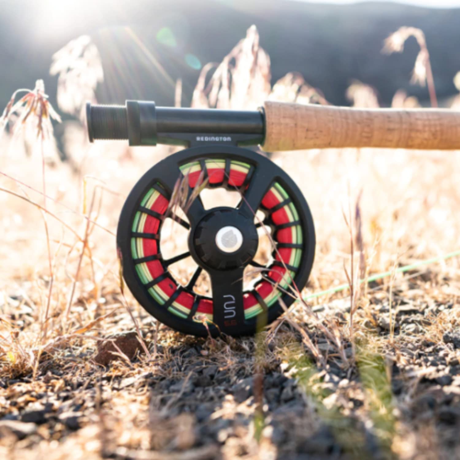 Redington Run fly reel featuring a soft-touch ergonomic handle for strong grip.