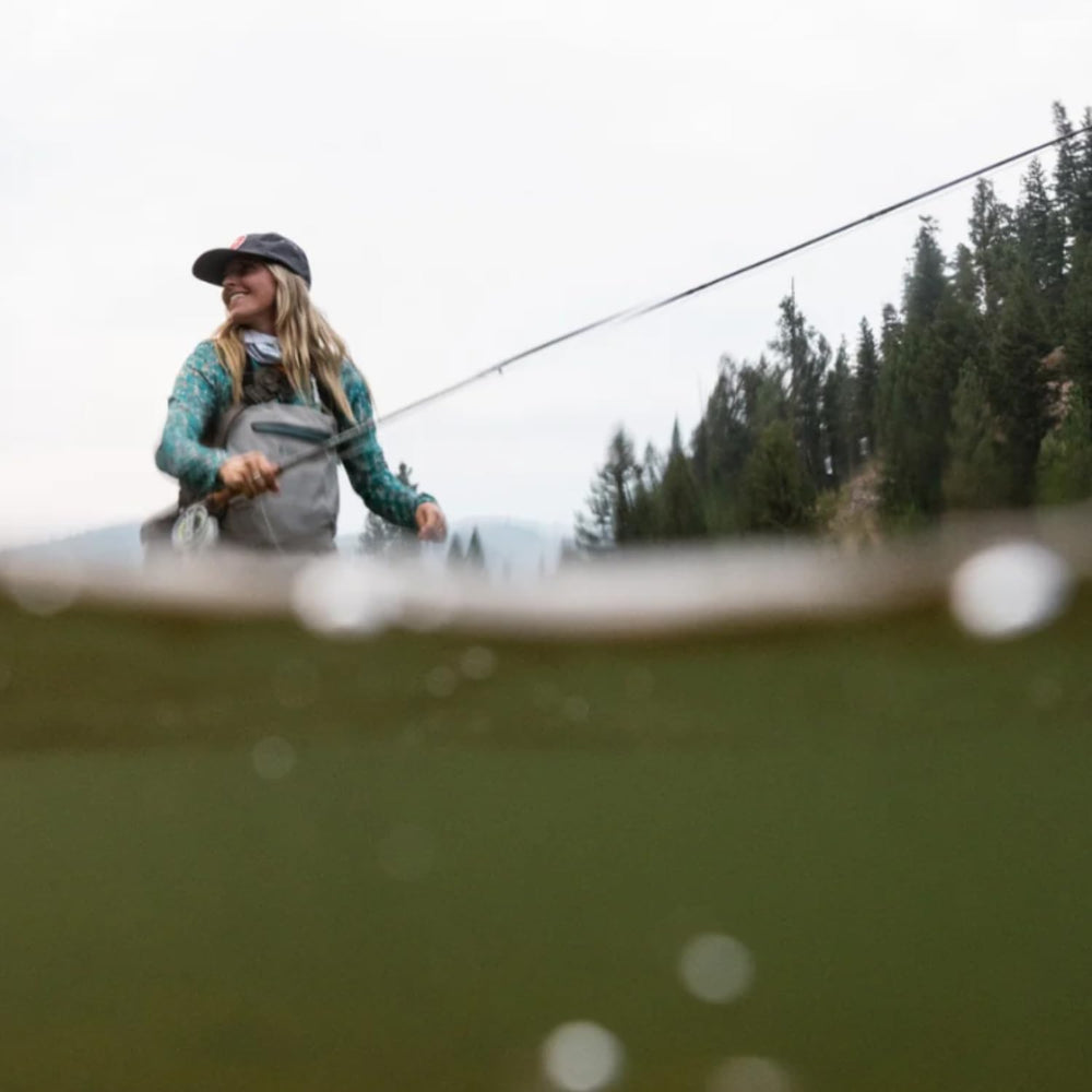 Redington Wrangler in-water scene shows versatility for trout fishing and more.