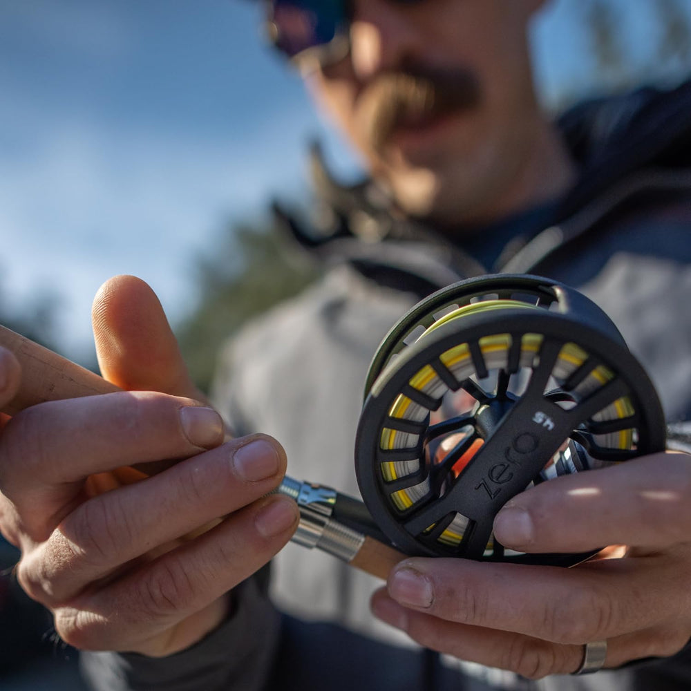Redington ZERO reel quick-change spool simplifies line swaps on the river.