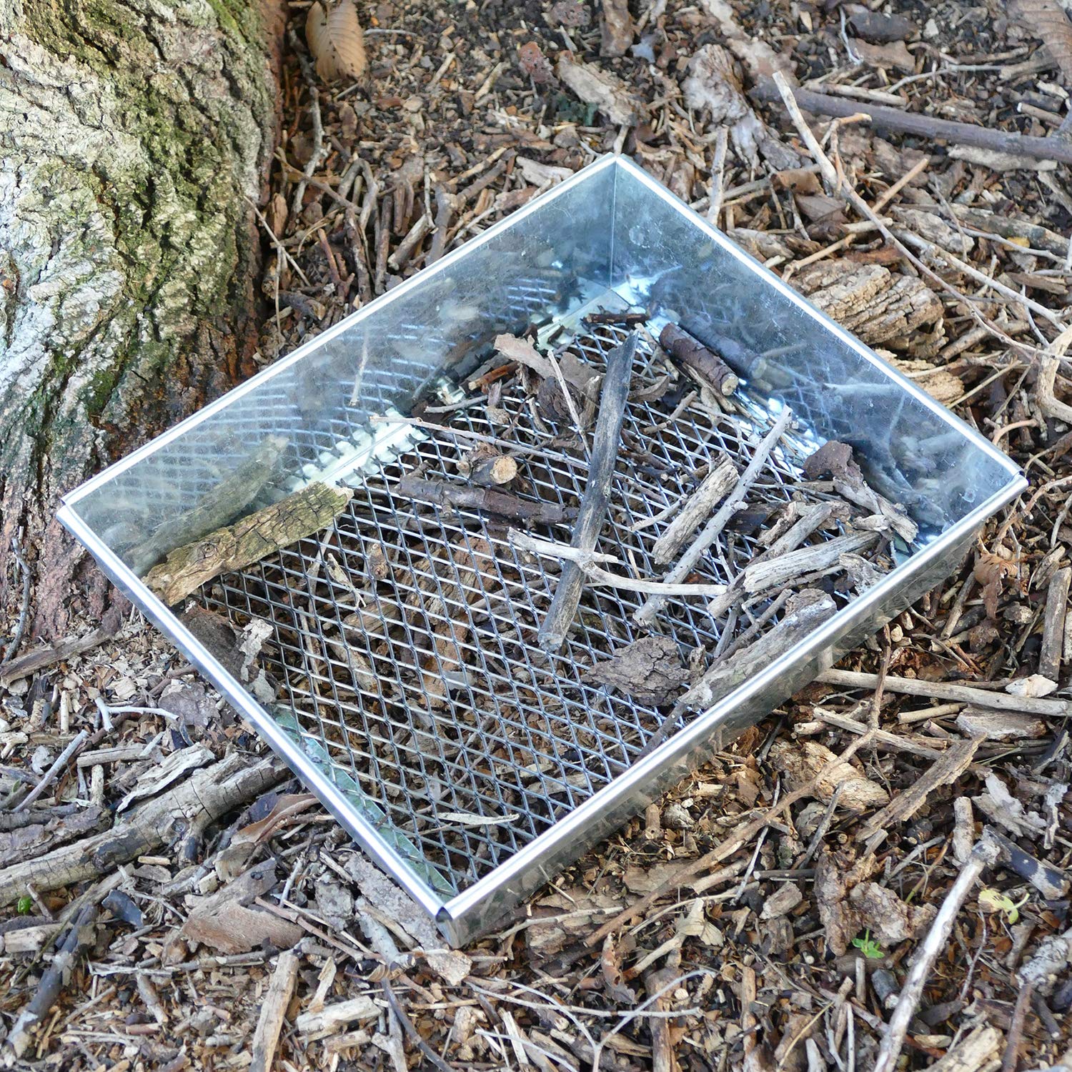 Redneck Convent Trapping Dirt Sifter garden use demonstrates versatility in removing rocks and debris from beds