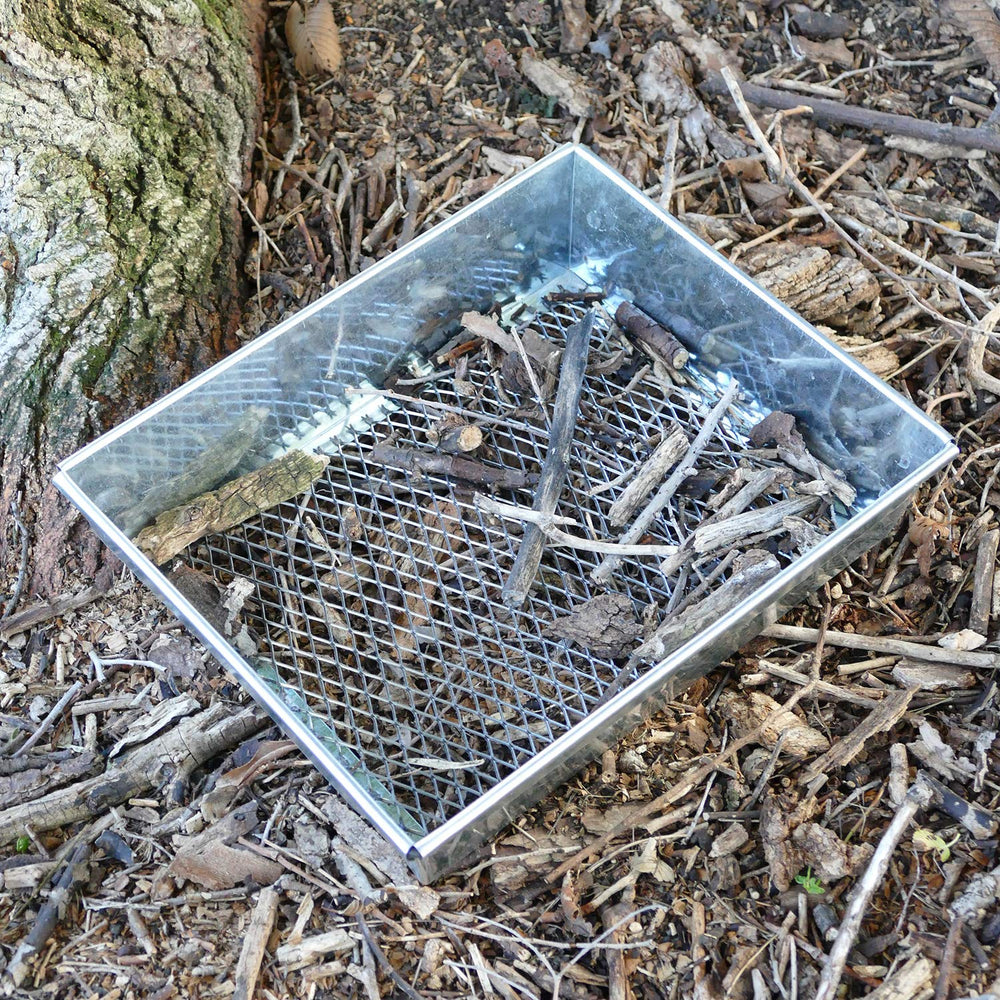 Redneck Convent Trapping Dirt Sifter garden use demonstrates versatility in removing rocks and debris from beds