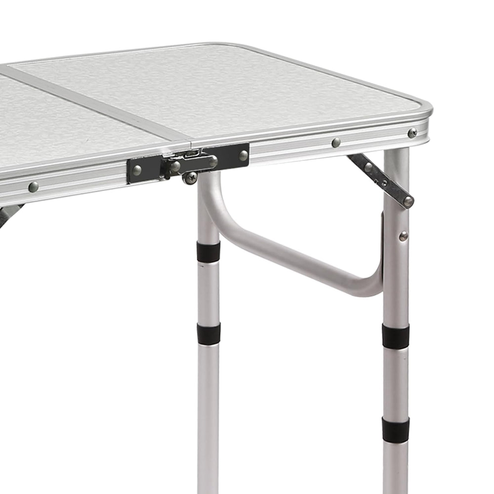 RedSwing lightweight aluminum table at the beach shows versatile use.