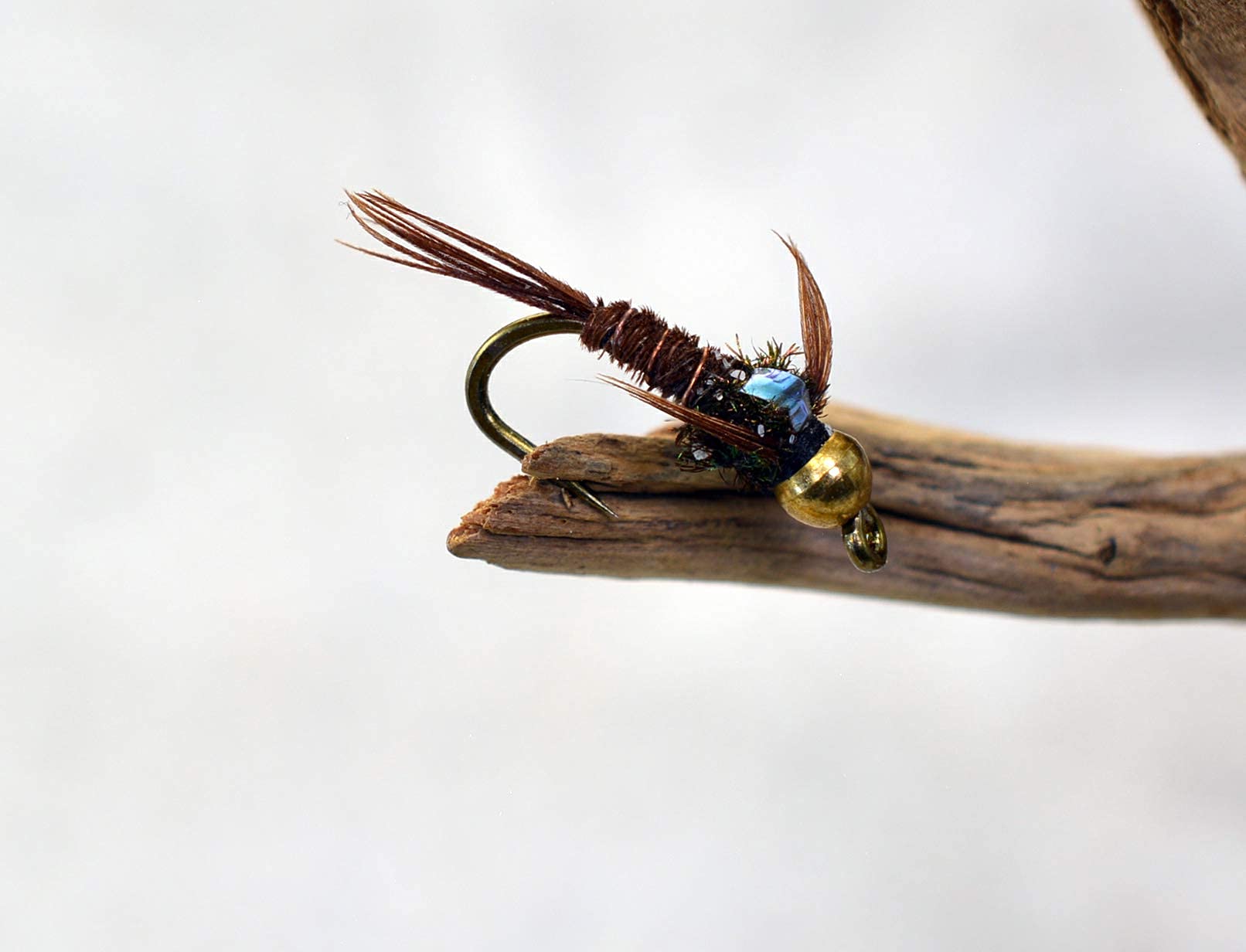 Region Fishing bead head flash back pheasant tail nymph side view shows durable Mustad hook and reliable performance