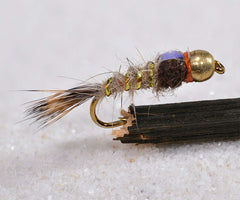 Region Fishing bead head gold ribbed hares ear nymph close up for trout
