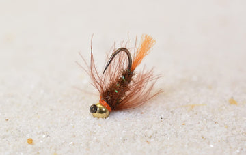 Region Fishing Blow Torch Jig Fly with orange tail aids euro nymphing in murky water