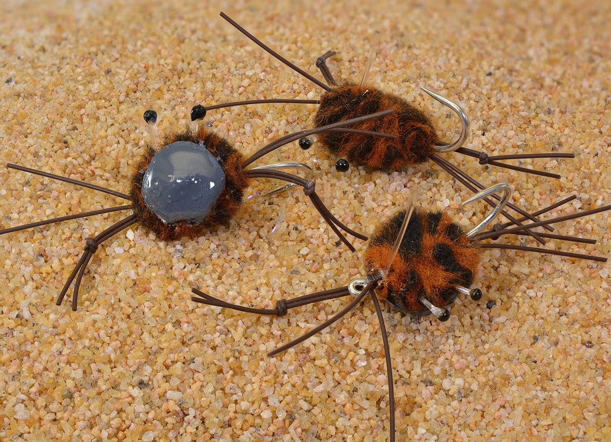 Region Fishing camo crab saltwater fly on Duratin hook for permit and bonefish.