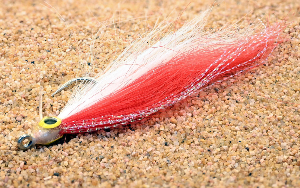 Region Fishing Cheat Code Saltwater Fly close-up hook 3/0 with weed guard for weedier waters.
