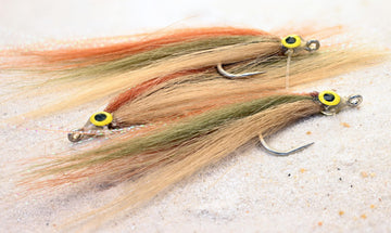 Region Fishing Cheat Code saltwater fly shown for tarpon, snook, and redfish action