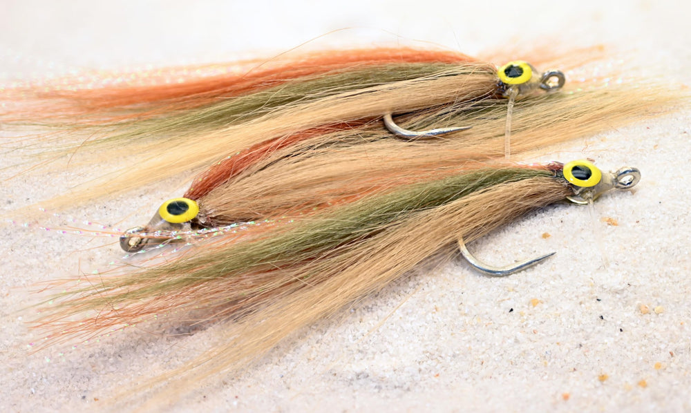 Region Fishing Cheat Code saltwater fly shown for tarpon, snook, and redfish action
